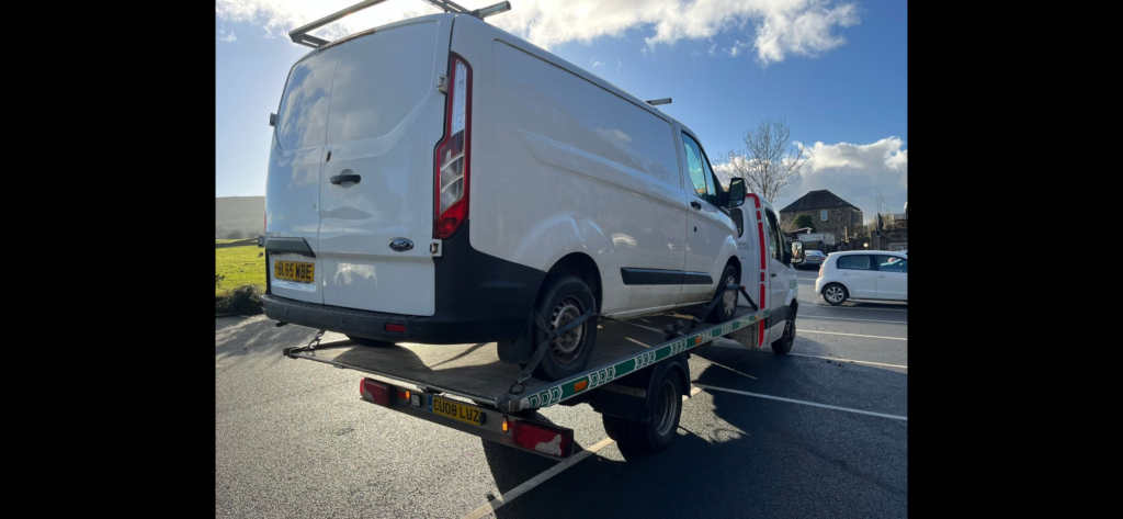 Ford Transit van on Leeds Car Recovery Mercedes CU08 LUZ