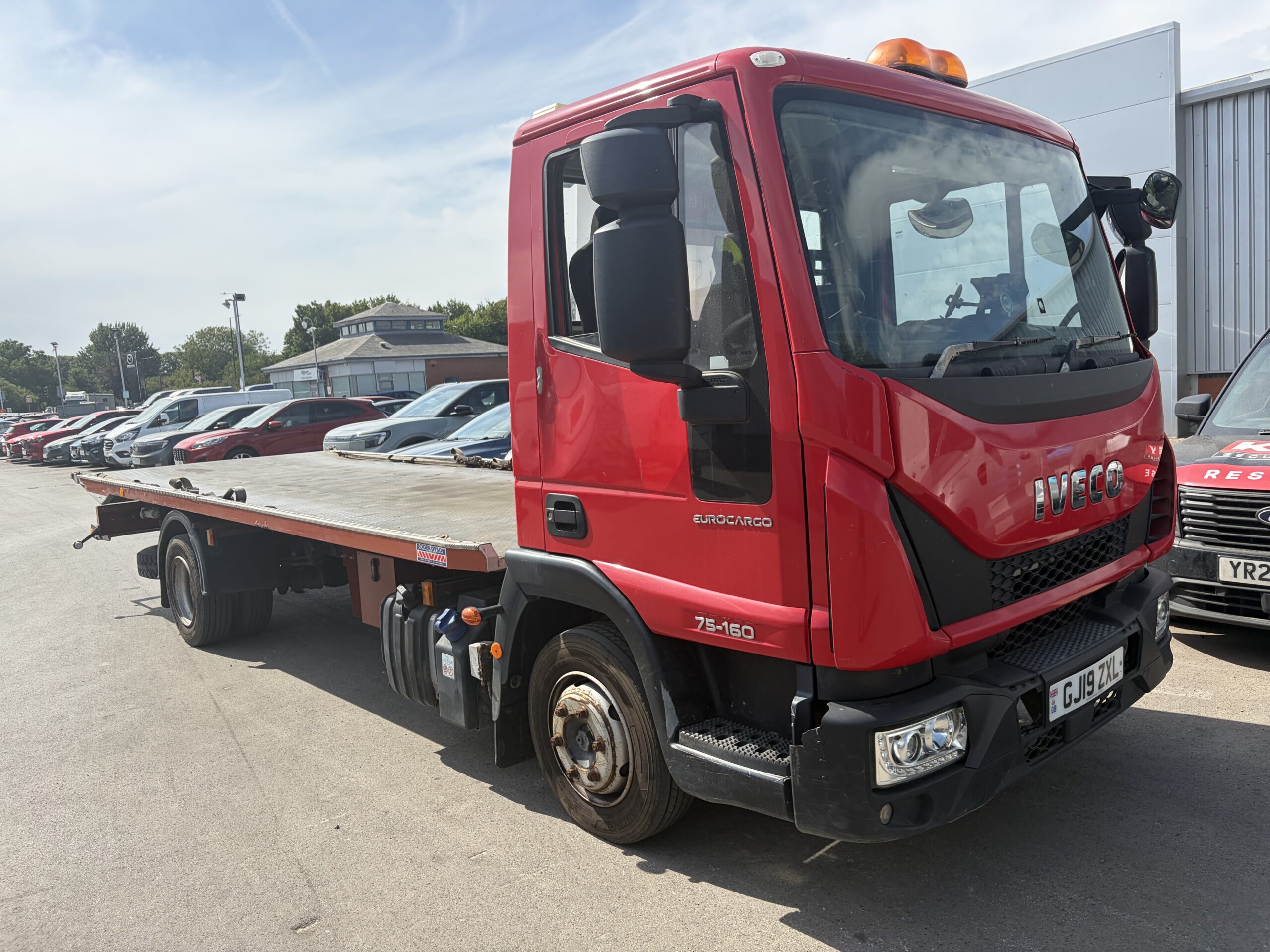 Red Iveco Eurocargo recovery truck GJ19 ZXL, Leeds Car Recovery